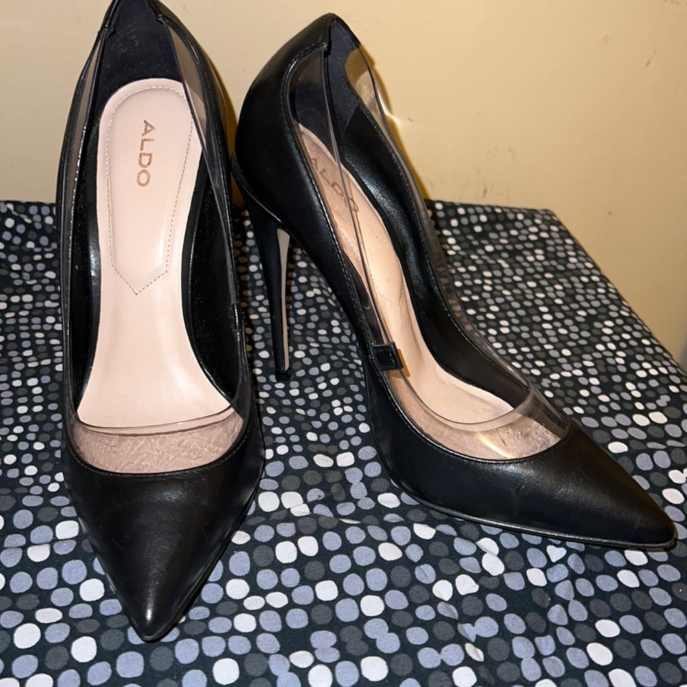 Black Aldo closed-toe heels.